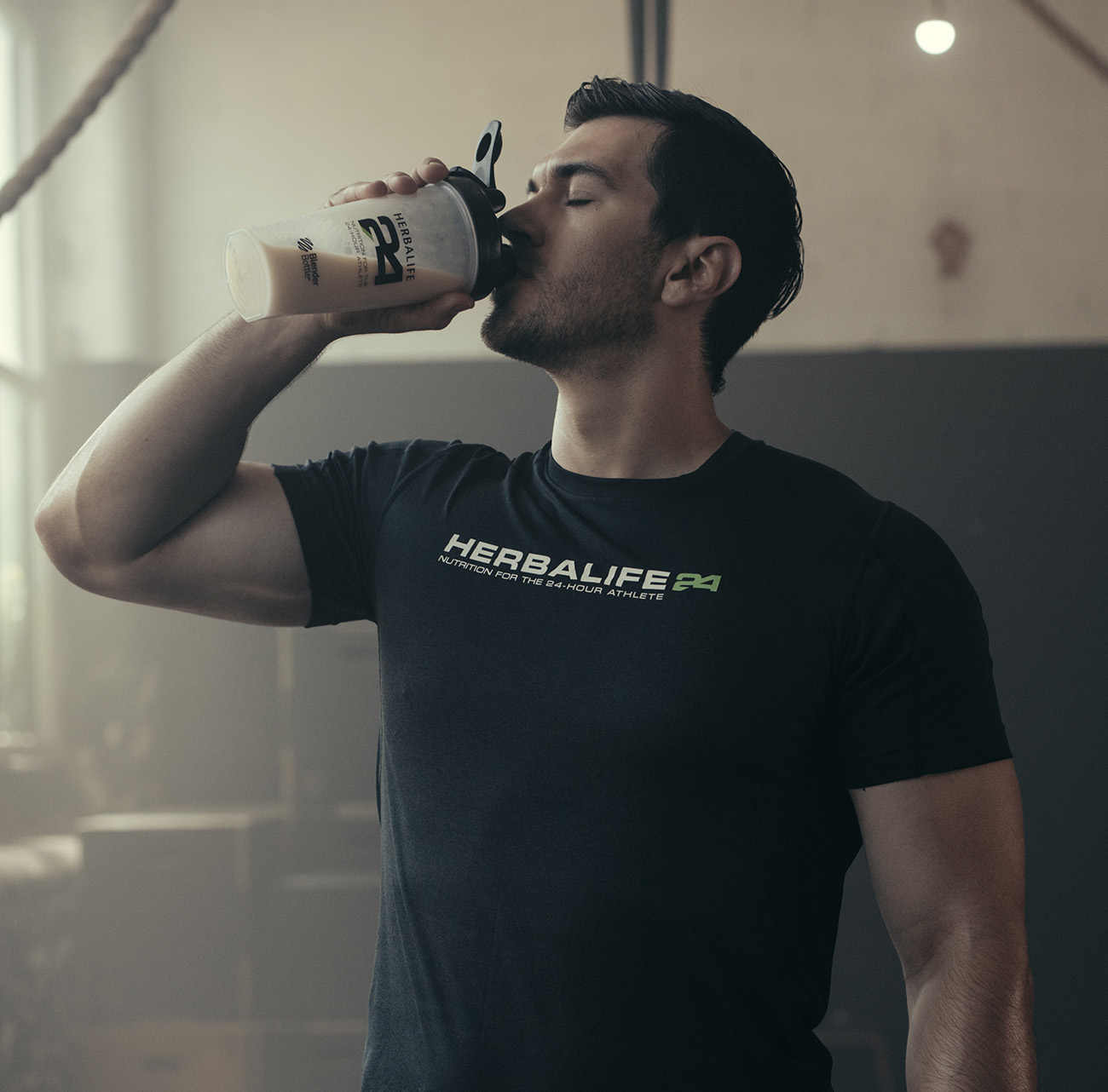 Man drinking protein shake after workout.
